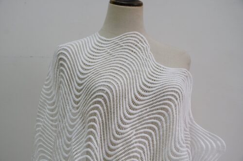 Wavy openwork lace-knit
