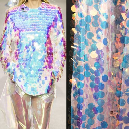 Sheer tulle fabric with iridescent circular sequins