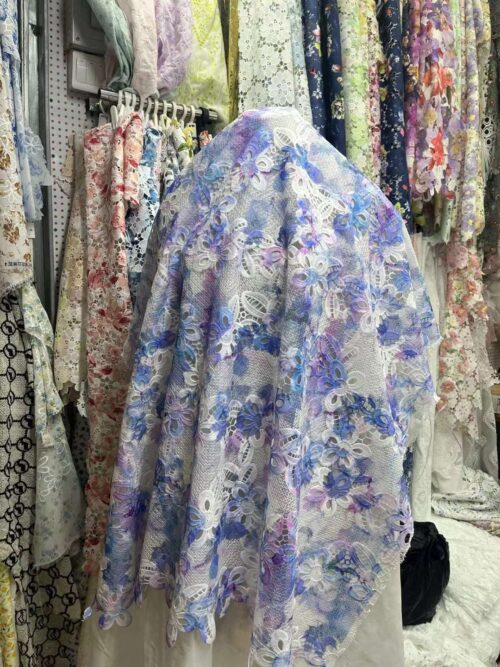 Embroidered lace fabric