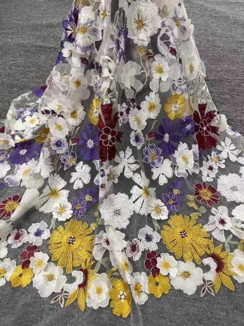 Intricate floral embroidered woven fabric