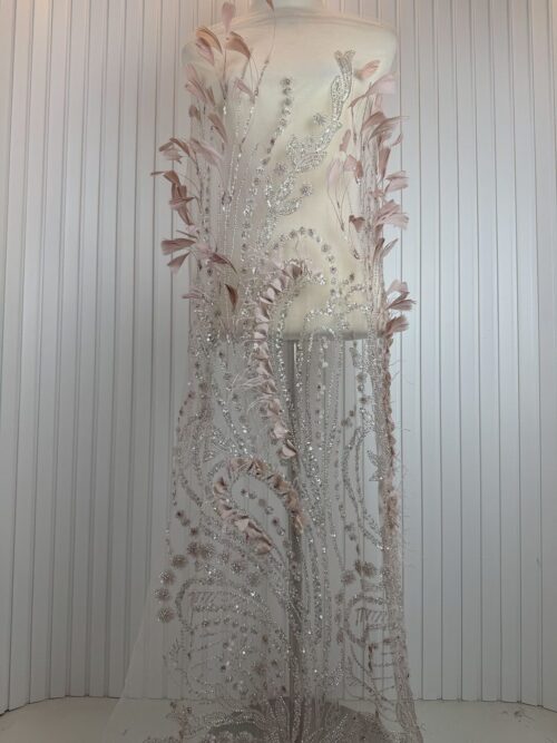 shimmering garment panel intricately embroidered with silver foliage and delicate beadwork